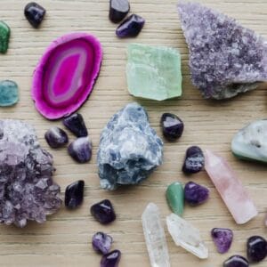 colorful-healing-crystals-on-a-wooden-table-2022-12-16-00-00-17-utc-min